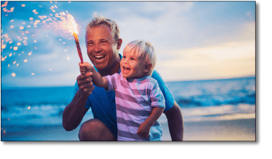 Father and Son holding Fireworks