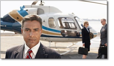 Executive with Helicopter